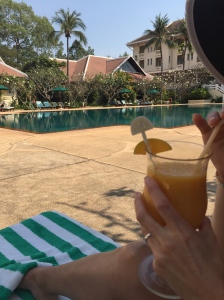 The Raffles pool and a delicious drink of mango and lime juice.